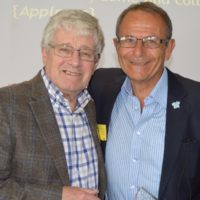 Professor Richard Ramsden presents Ronnie Bourne with the Heather Jackson award