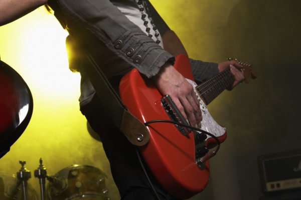 Musician playing electric guitar