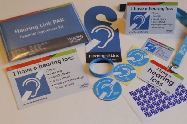 Hearing Link personal awareness kit with badges, stickers and cards
