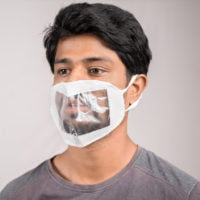 man wearing a transparent face mask