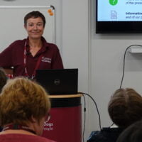 Peer support volunteer delivering an in-person Helpful Hour