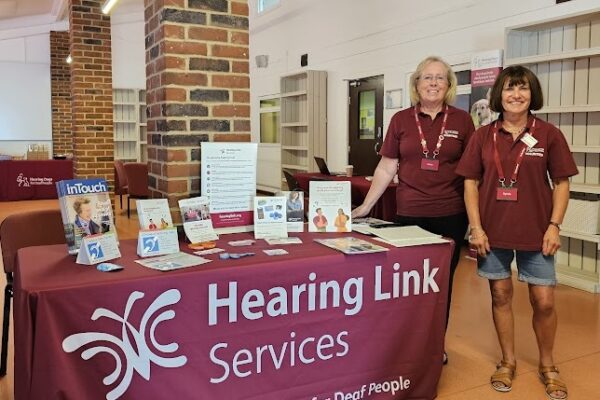 Peer support volunteers provide information and advice at our Hearing Loss Community Days