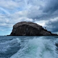 Landscape Image of Bass Rock in East Lothian ttaken from the point of view from a boat.